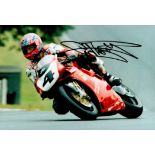Carl Fogarty MBE (Motor Racing) Handsigned 12x8 Colour Photo showing Fogarty riding a Red Motorbike.