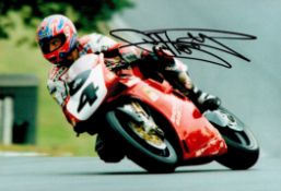 Carl Fogarty MBE (Motor Racing) Handsigned 12x8 Colour Photo showing Fogarty riding a Red Motorbike.