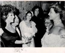 Joan Collins Handsigned 10x8 Black and White Photo. Photo Shows Collins having a laugh amongst