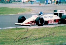 F1. Derek Warwick Handsigned 6x4 Colour Photo. Photo shows Warwick in his F1 car on the Racetrack.