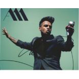 Singer Aston Merrygold signed 10x8 colour photo in excellent condition. Aston Iain Merrygold is an