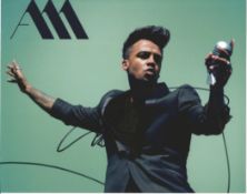 Singer Aston Merrygold signed 10x8 colour photo in excellent condition. Aston Iain Merrygold is an