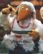 Albert Wilkinson signed 10x8 Womble coloured photo. Good condition. All autographs come with a