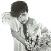 Joan Collins signed 12x8 B/W photo. Good condition. All autographs come with a Certificate of