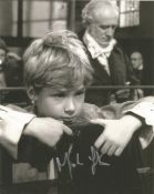 Mark Lester 10x8 signed black and white photo. Mark Lester is an English former child actor,