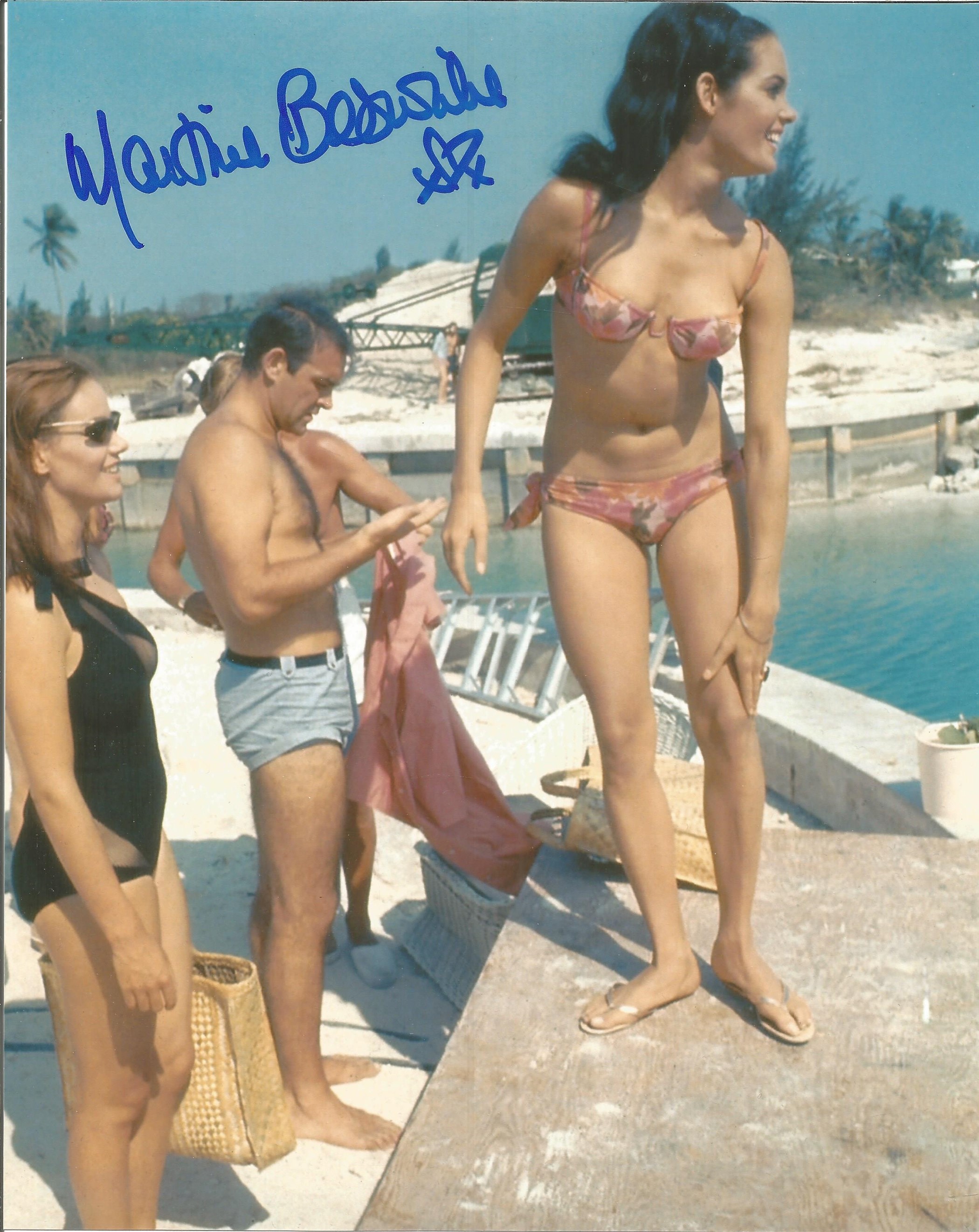 Martine Beswick signed 10 x 8 inch colour James Bond photo on pier with Sean Connery. Good