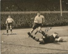 Terry Medwin and Bobby Smith signed 10x8 original black and white photo pictured in action for
