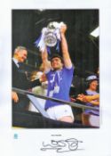 Football. Everton. Kevin Ratcliffe Signed 17x12 colour photo. Photo shows Ratcliffe Lifting the