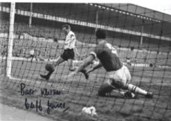 Football. Cliff Jones Signed 12x8 Black and white photo. Photo shows Jones Scoring for Tottenham