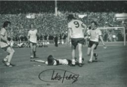 Football Charlie George signed 12x8 Arsenal 1971 black and white photo. Good condition. All