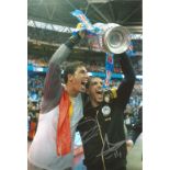 Jordi Gomez and Louis Robles Wigan Signed 12 x 8 inch football photo. Good condition. All autographs
