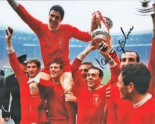 Football. Ian St John signed 10x8 colour photo. Photo shows St John Celebrating the FA Cup for