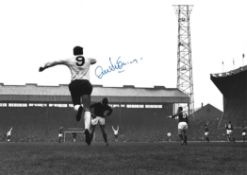 Football. Alex Stepney signed 10x12 Black and white photo. Photo shows Stepney Celebrating in the