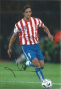 Football Roque Santa Cruz 12x8 signed colour photo pictured in action for Paraguay. Good
