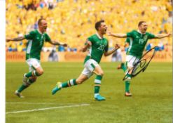 Robbie Brady Ireland Signed 16 x 12 inch football photo. Good condition. All autographs come with
