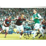 Danny Granger Hearts Signed 12x 8 inch football photo. Good condition. All autographs come with a