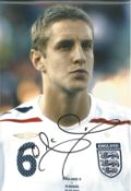 Football Michael Dawson signed England 12x8 colour photo. Michael Richard Dawson (born 18 November