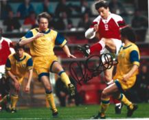 Football. Alan Smith signed 10x8 colour photo. Photo shows Smith in Action for Arsenal. Good