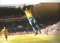 Yannick Bolasie Crystal Palace Signed 10 x 8 inch football photo. Good condition. All autographs