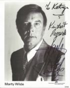 Marty Wilde signed 10x8 black and white photo. Dedicated. Good condition. All autographs come with a