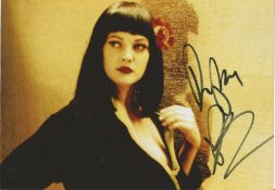 Drew Barrymore signed 10x7 colour photo. Good condition. All autographs come with a Certificate of