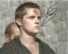 Eugene Simon signed 10x8 colour photo. Good condition. All autographs come with a Certificate of