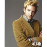 Bradley Cooper American Actor Signed 10x8 Colour Photo From The TV Series Alias. Good condition. All