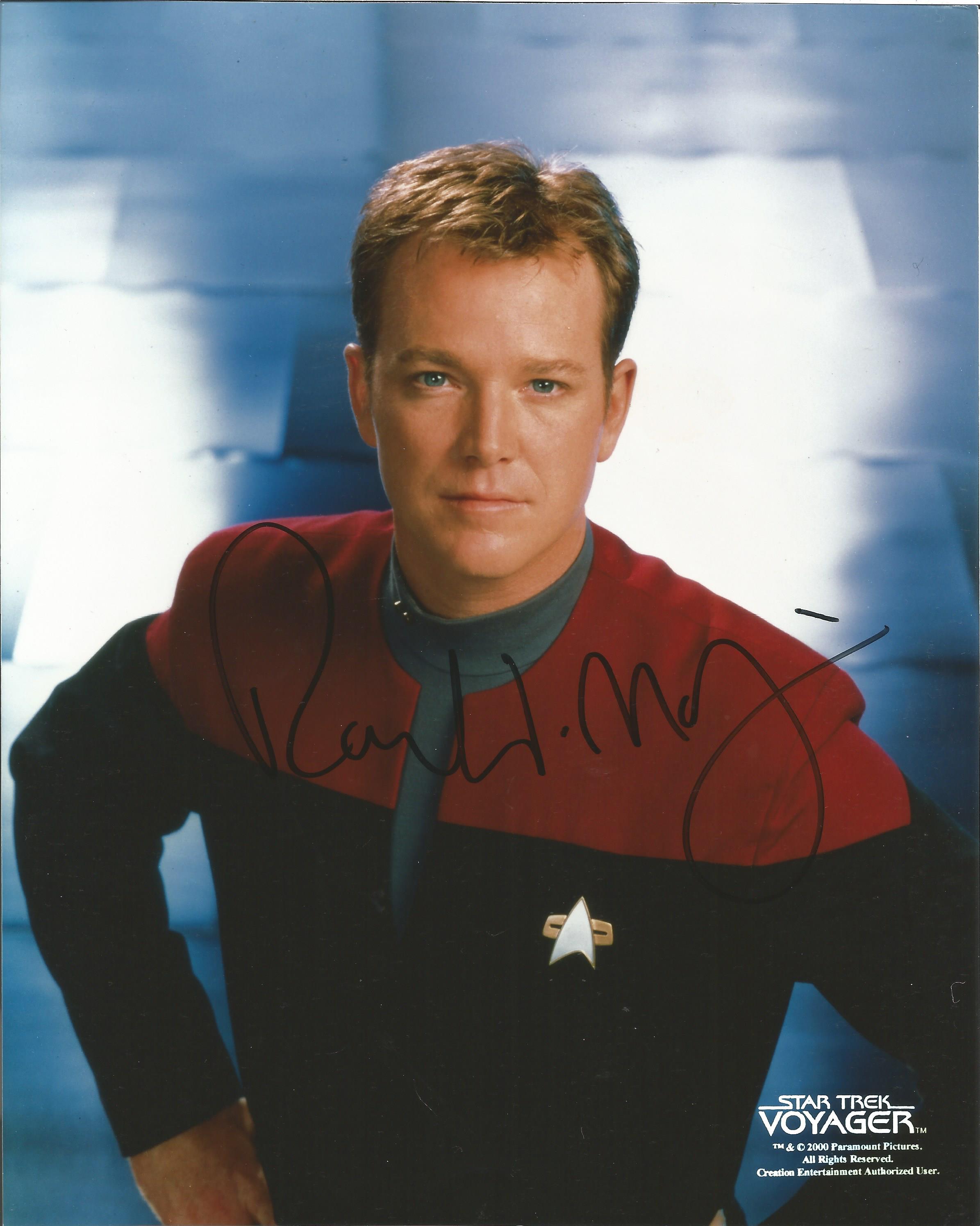 Robert Duncan Mcneill signed 10x8 colour Star Trek photo. Good condition. All autographs come with a