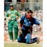 Cricketer Ashley Giles Hand signed 10x8 Colour Photo showing Giles in action for England Cricket