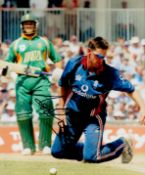 Cricketer Ashley Giles Hand signed 10x8 Colour Photo showing Giles in action for England Cricket