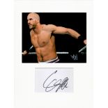 Cesaro WWE 16x12 overall mounted signature piece includes signed album page and a fantastic colour