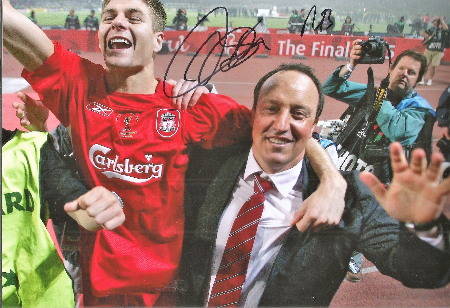 Rafael Benitez Hand signed 10x8 Colour Photo showing Benitez Celebrating Victoriously with Anfield