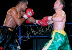 Boxer Steve Robinson Hand signed 10x8 Colour Photo Showing Robinson during a fight. Good