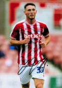 Stoke City FC Midfielder Jordan Thompson Hand signed 10x8 Colour Photo showing Thompson in action.