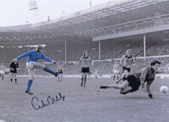Autographed Colin Bell 16 X 12 Photo - Colorized, Depicting Bell Shooting Past Wolves Goalkeeper