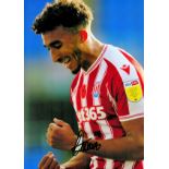 Stoke City FC Striker Jacob Brown Hand signed 10x8 Colour Photo showing Brown Celebrating after