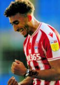 Stoke City FC Striker Jacob Brown Hand signed 10x8 Colour Photo showing Brown Celebrating after