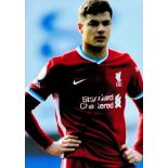 Football Ozan Kabak signed Liverpool 12x10 colour photo. Good condition. All autographs come with