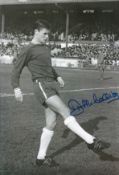 Scottish Legend Jim McCalliog Hand signed 10x8 Black and White Photo showing McCalliog warming up