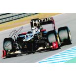 Motor Racing Kimi Raikkonen signed Lotus Formula One 12x8 colour photo. Nicknamed The Iceman is a