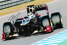 Motor Racing Kimi Raikkonen signed Lotus Formula One 12x8 colour photo. Nicknamed The Iceman is a