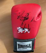 Boxer Deontay Wilder Signed 10oz Red Lonsdale Boxing Glove. Signed in black marker pen. Good