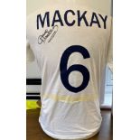 Football Legend Dave Mackay Hand signed 'Fruit of the Loom' T-Shirt. Number 6 Mackay on reverse.