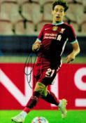 Liverpool FC Defender Kostas Tsimikas hand signed 10x8 colour photo showing Tsimikas in action. Good