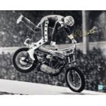 Legend Evel Knievel Hand signed 20x16 Black and White Photo showing Knievel doing a Motorbike Stunt.