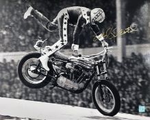 Legend Evel Knievel Hand signed 20x16 Black and White Photo showing Knievel doing a Motorbike Stunt.