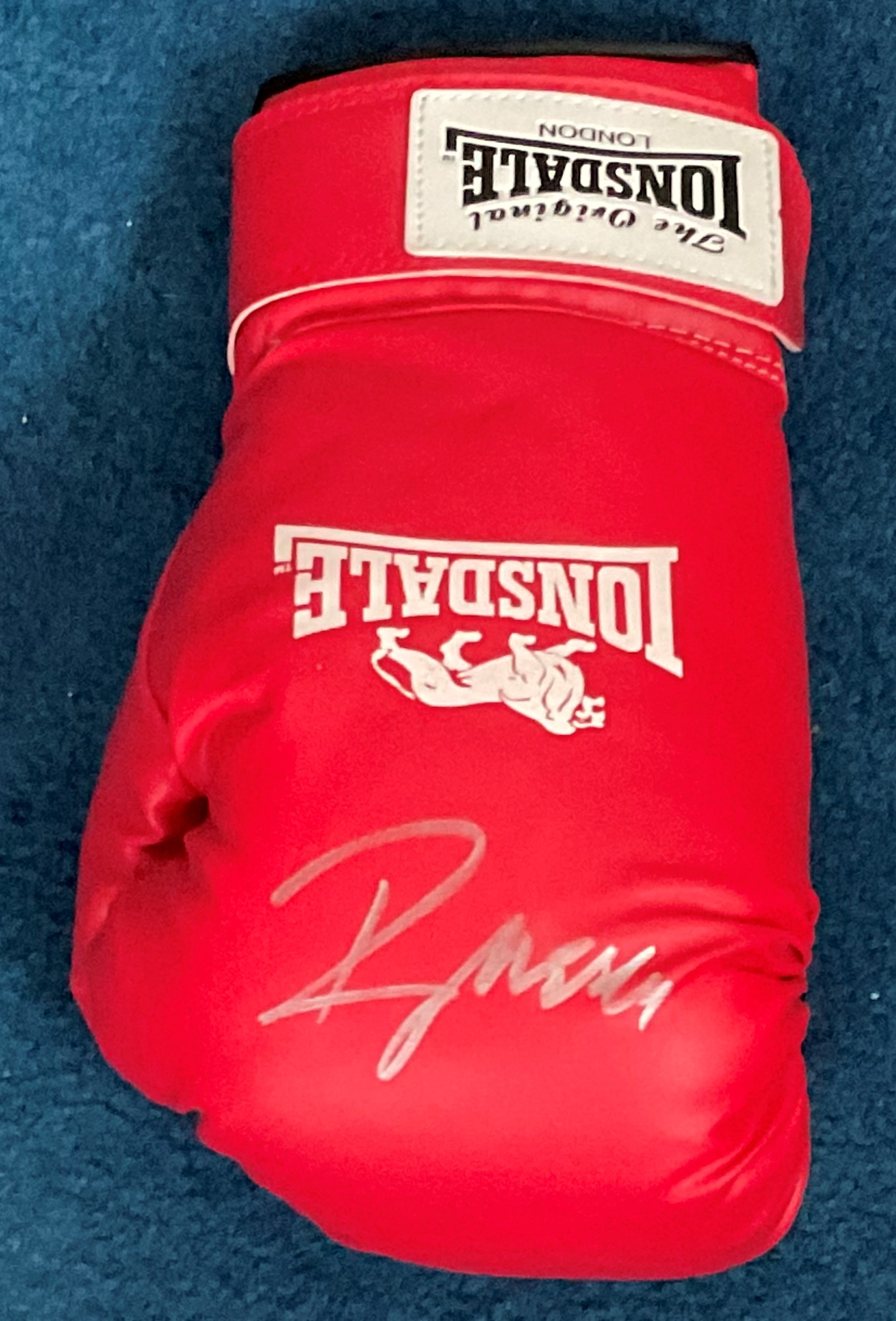 Lonsdale boxing glove signed by former heavyweight champion Ray Mercer. Raymond Anthony Mercer is