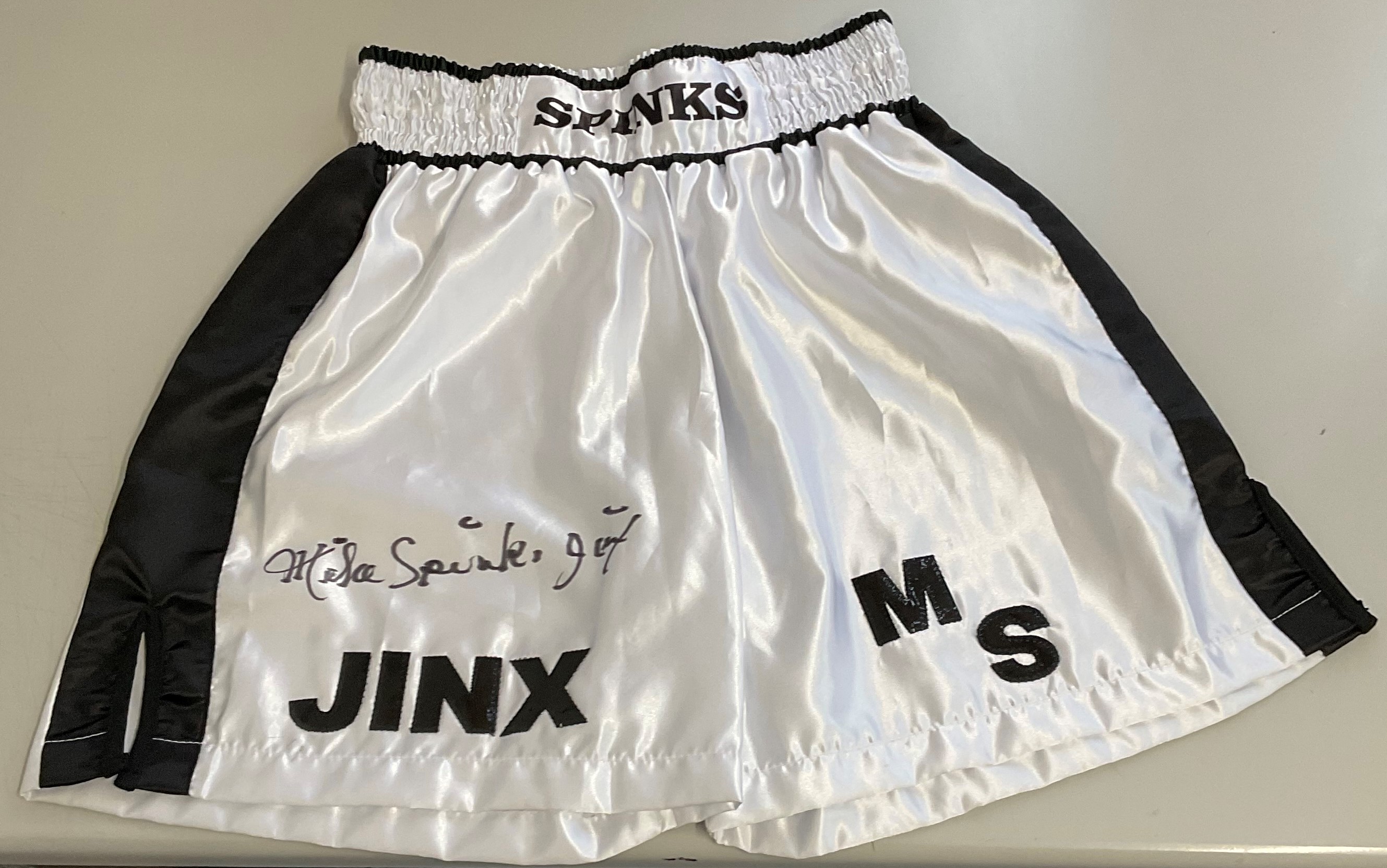 Boxing Michael Spinks signed replica black and white Boxing Shorts. Michael Spinks (born July 13,