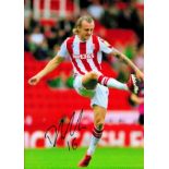 Stoke City Defender Ben Wilmot Hand signed 10x8 Colour Photo showing Wilmot kicking the ball. Good