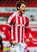 Stoke City FC Midfielder Nick Powell Hand signed 10x8 Colour Photo showing Powell Celebrating.
